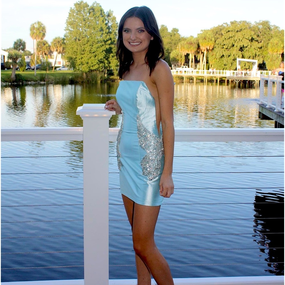 This dress is absolutely stunning, I wish I could wear it more than once!